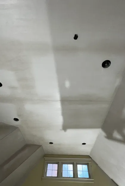 smooth plastered cathedral ceiling detail