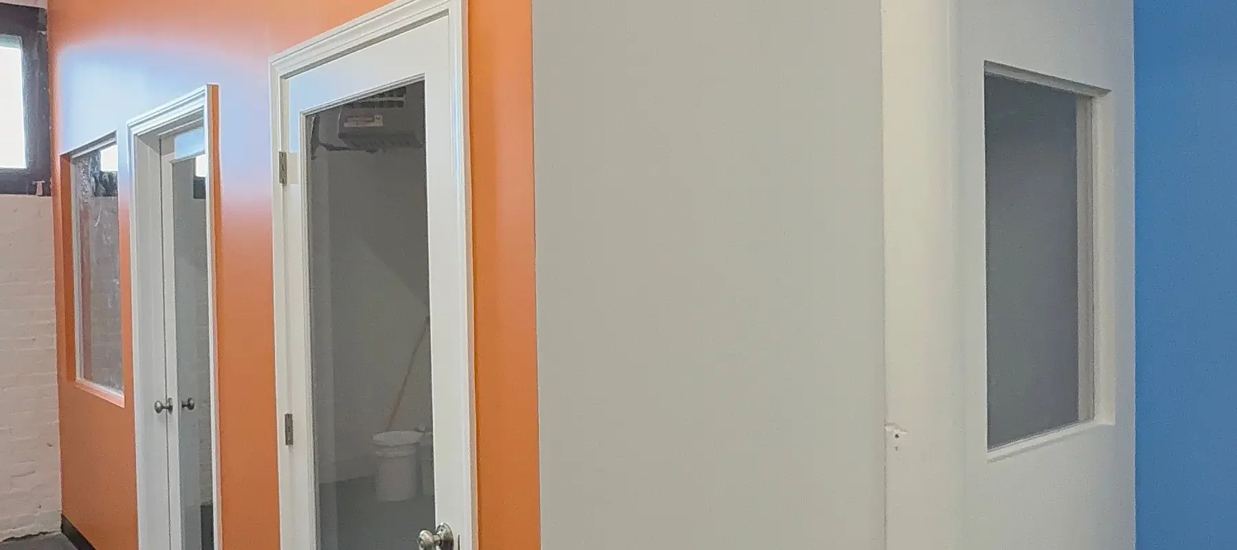 Drywall and interior finishing work in a large Boston property