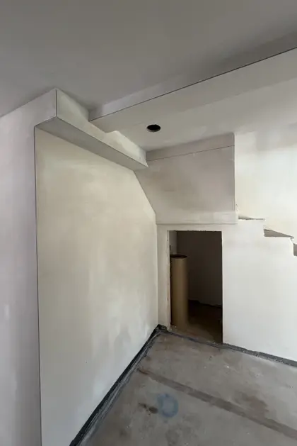 freshly plastered stairwell and landing